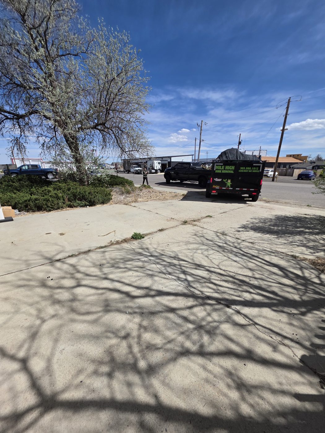 Mile High Junk Removal trailer loaded and ready to haul away a Denver cleanout